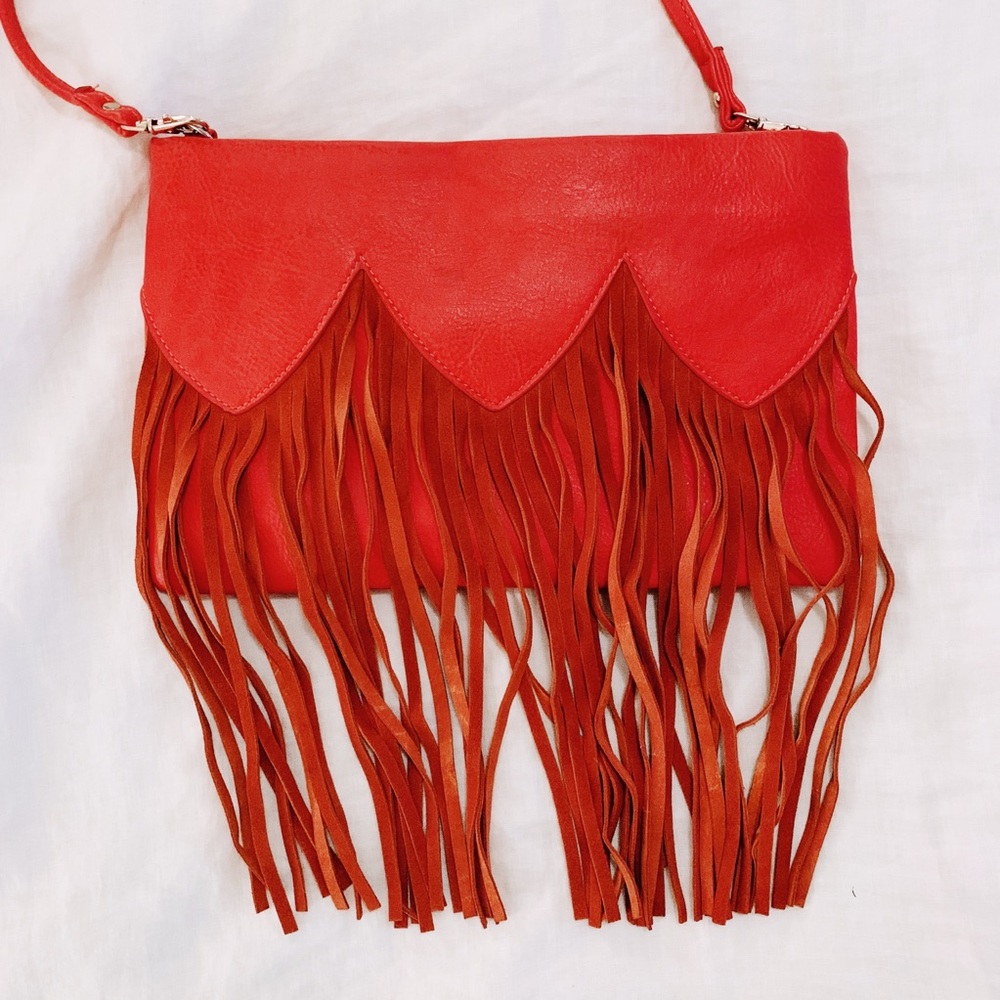 Orange crossbody bag with fringe!